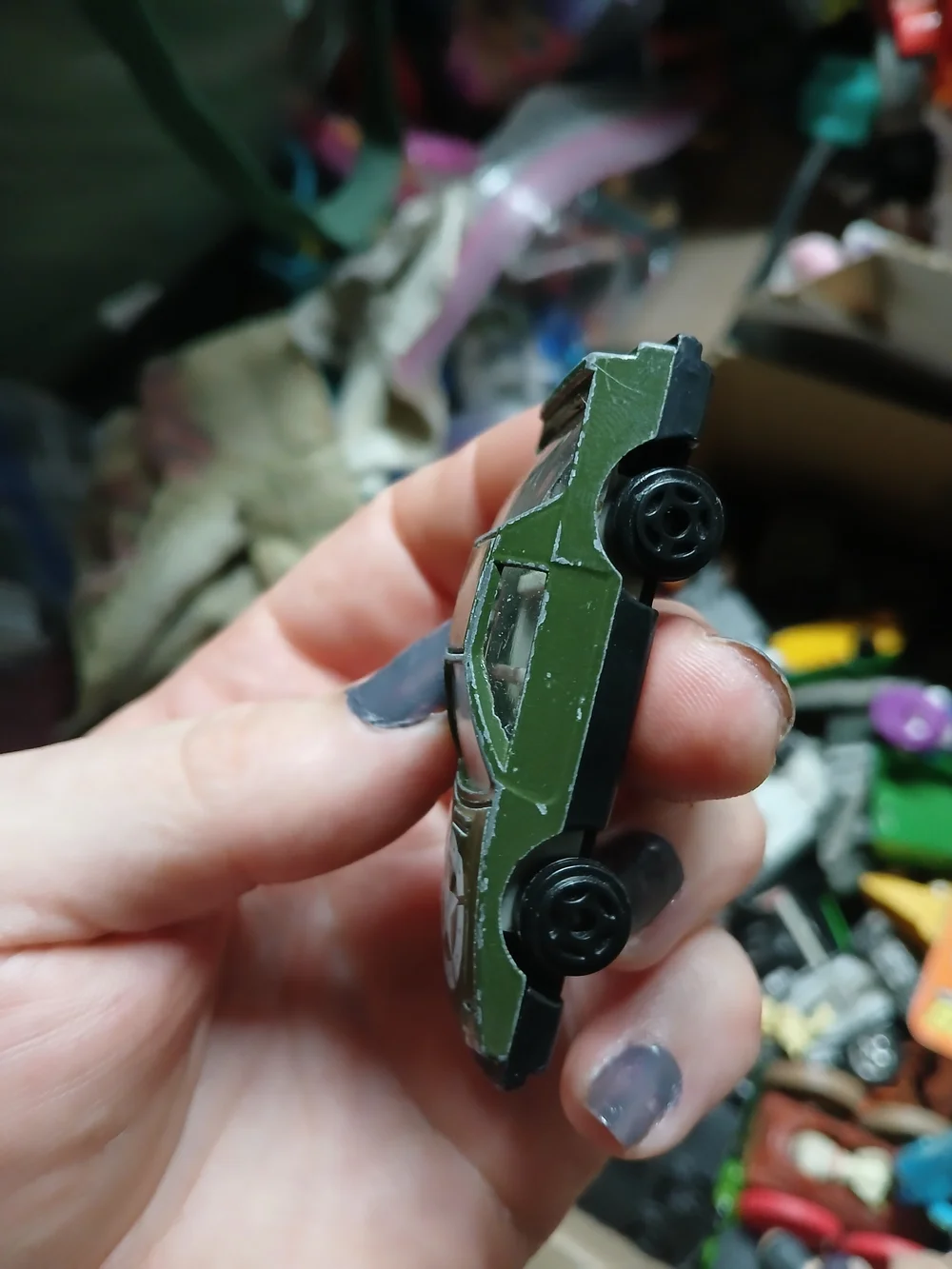 1:64 scale Pontiac Firebird Trans Am die-cast car  an army green 